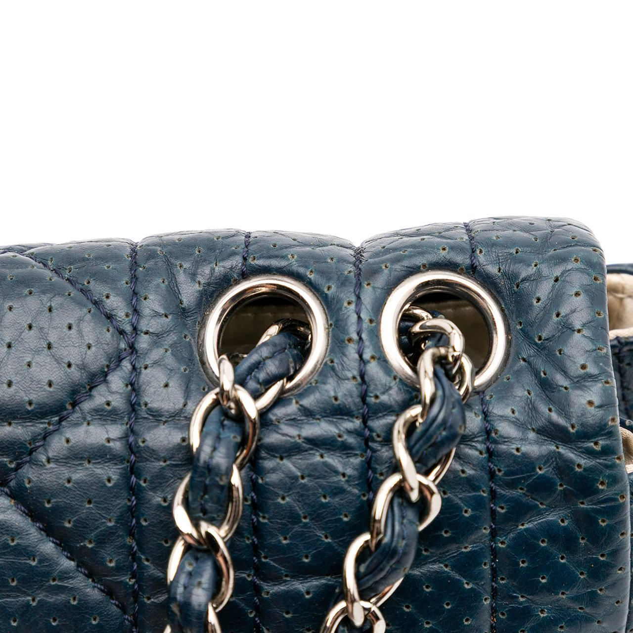 Chanel CC Quilted Perforated Aged Calfskin Flap Blauw