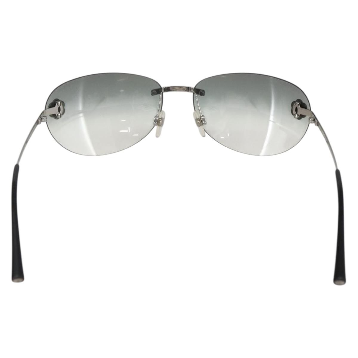 Chanel Chanel Camélia sunglasses Metal Zwart