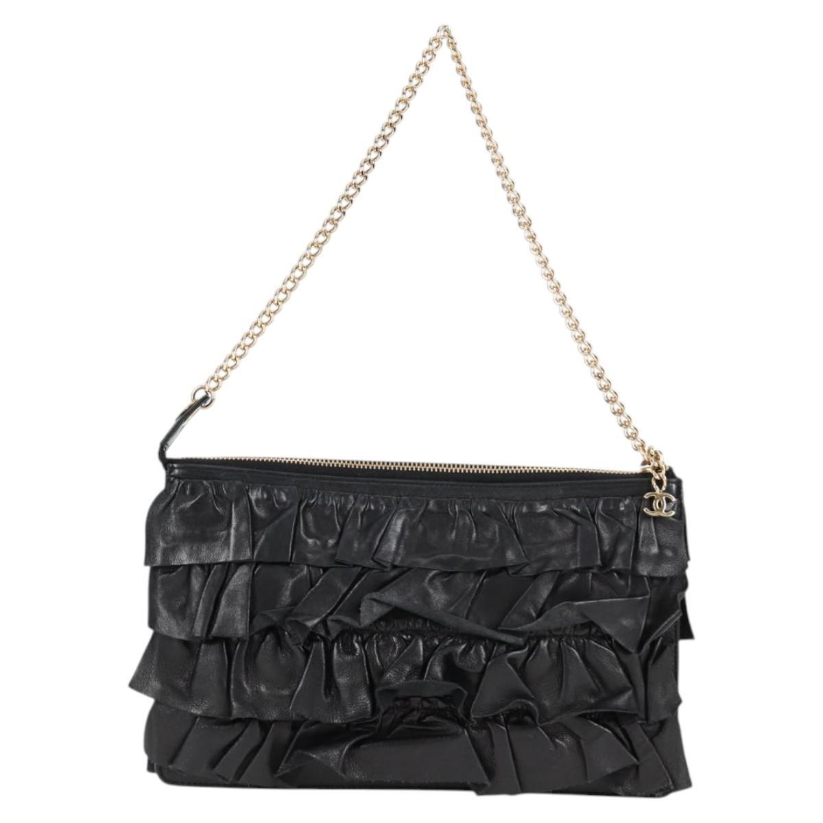 Chanel Chanel CC Chain Fringe Wristlet Clutch Quilted Leather Zwart