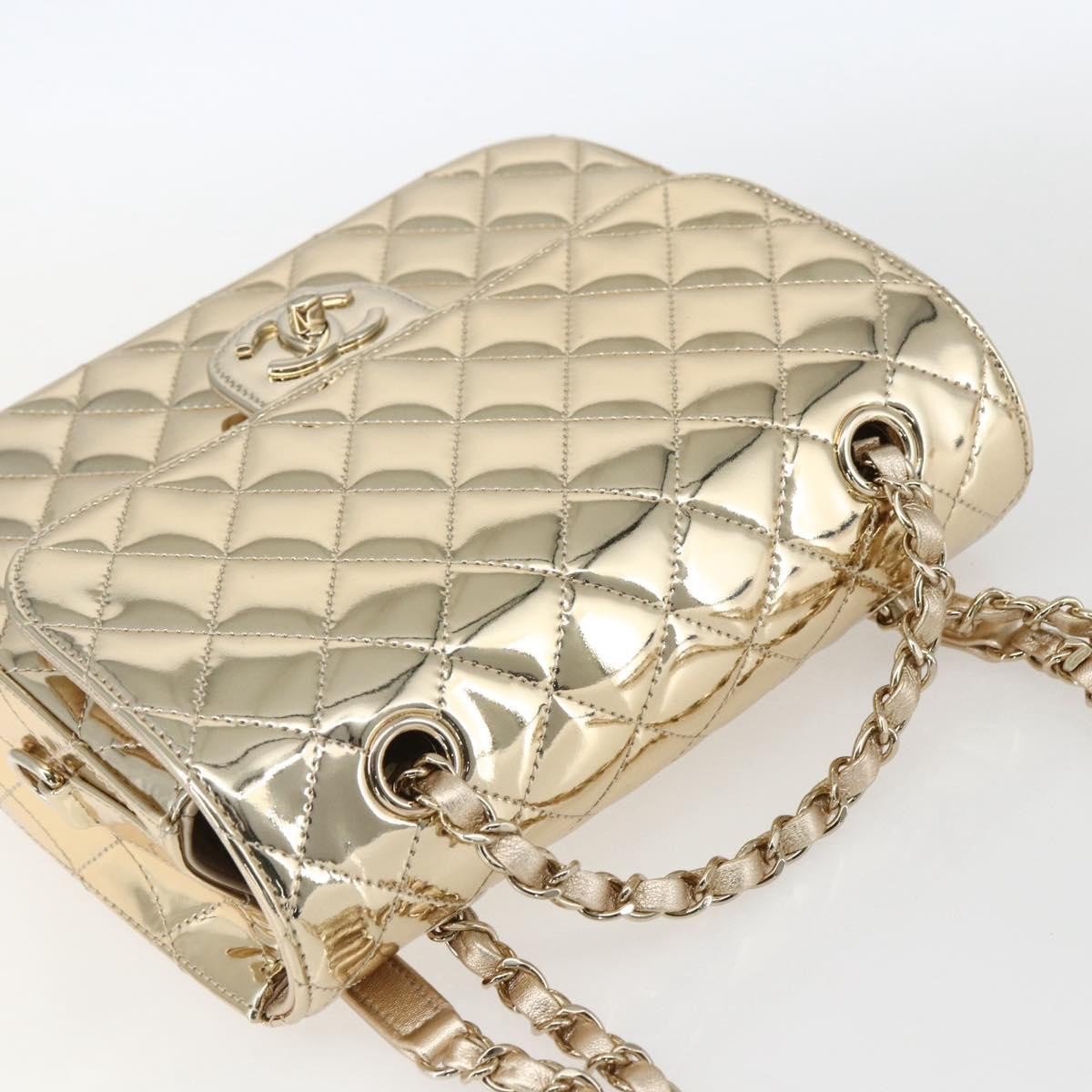 Chanel Hollywood Boulevard Backpack with Star Coin Purse Quilted Metallic Leather Goud