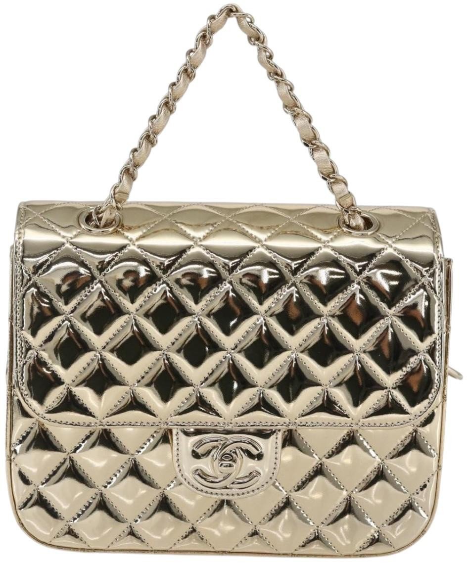 Chanel Hollywood Boulevard Backpack with Star Coin Purse Quilted Metallic Leather Goud