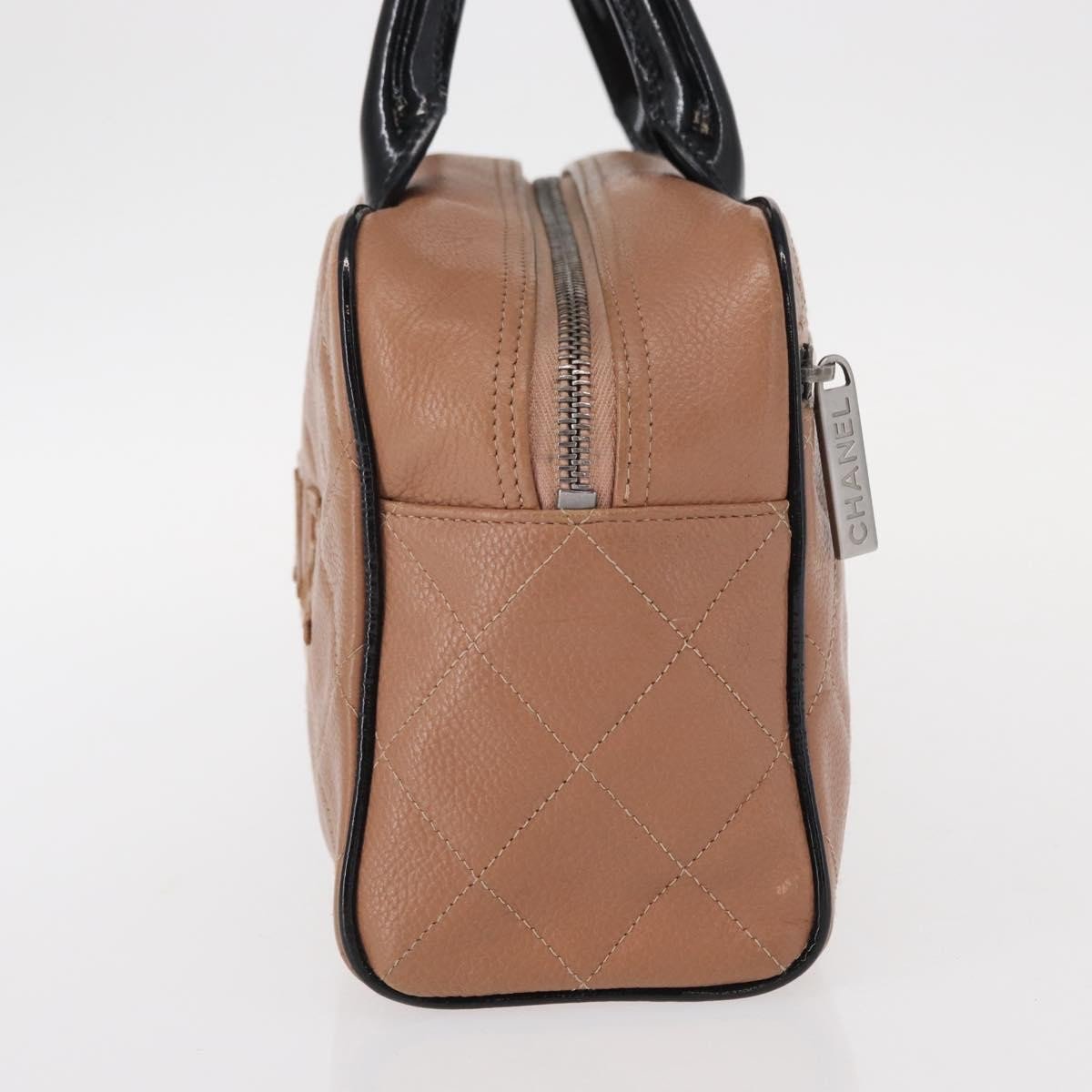 Chanel Chanel Embossed Logo Bowler Bag Quilted Caviar Small Beige