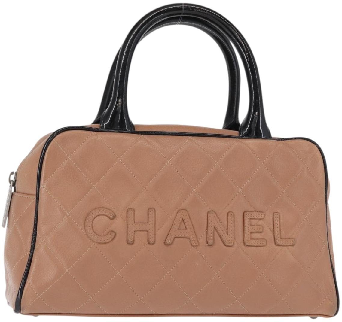 Chanel Chanel Embossed Logo Bowler Bag Quilted Caviar Small Beige