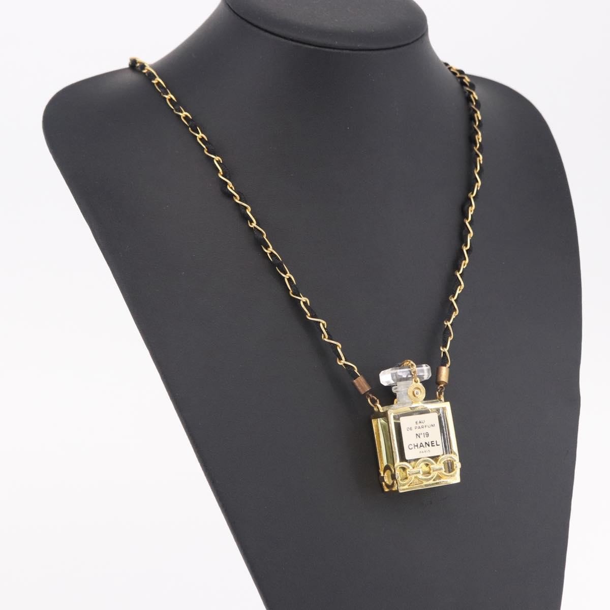 Chanel CC Perfume Bottle Pendant Chain Long Metal with Leather, Crystals and Faux Pearl Goud