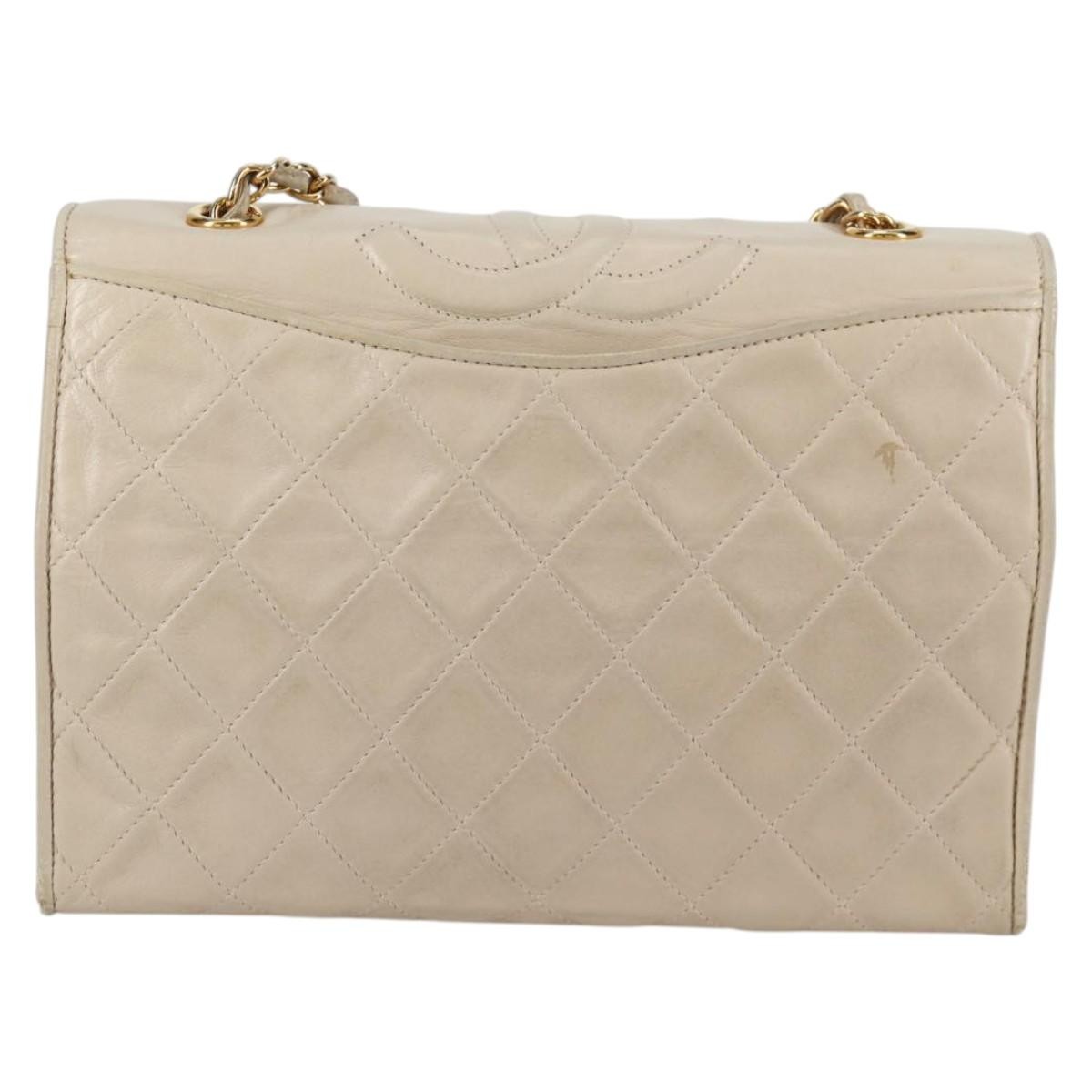 Chanel Chanel Vintage Tassel Flap Bag Quilted Lambskin Mini Goud