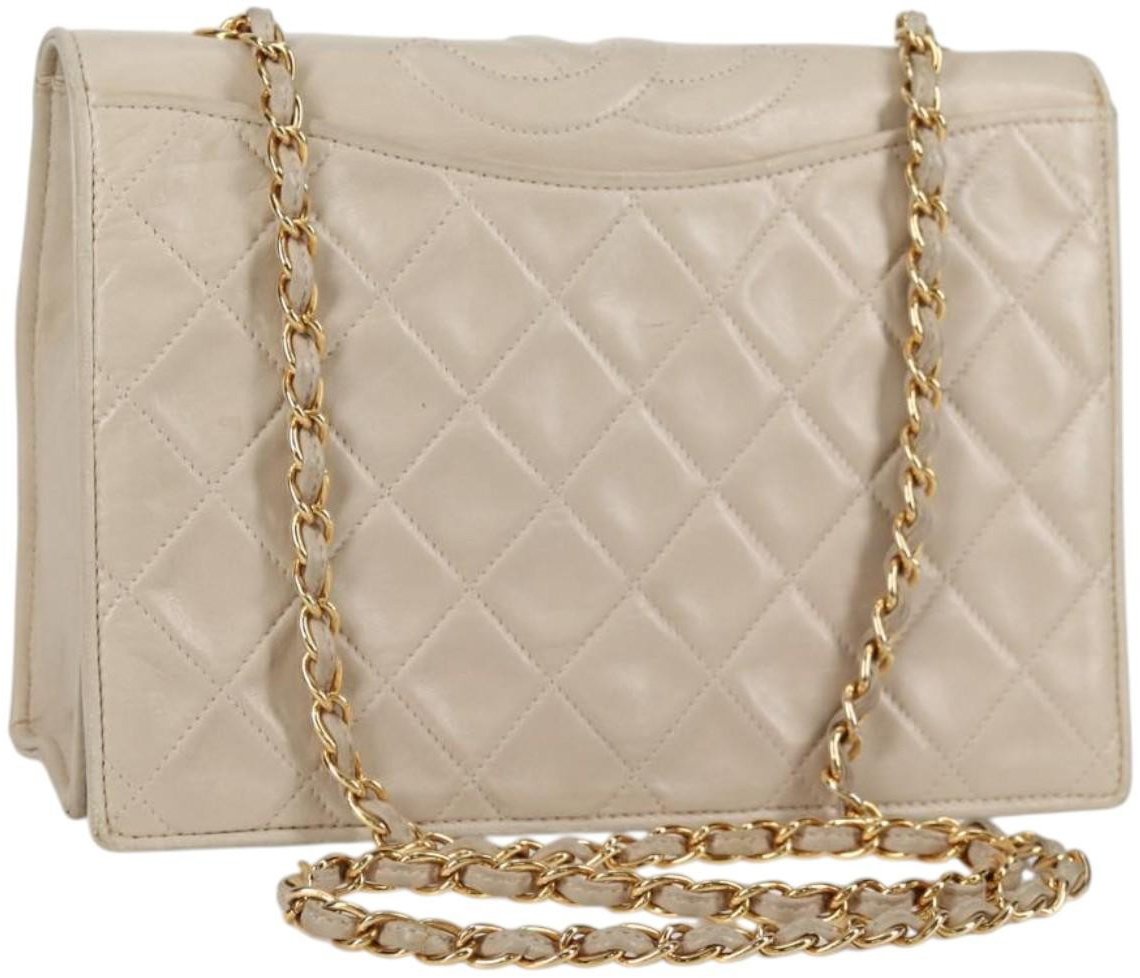Chanel Chanel Vintage Tassel Flap Bag Quilted Lambskin Mini Goud