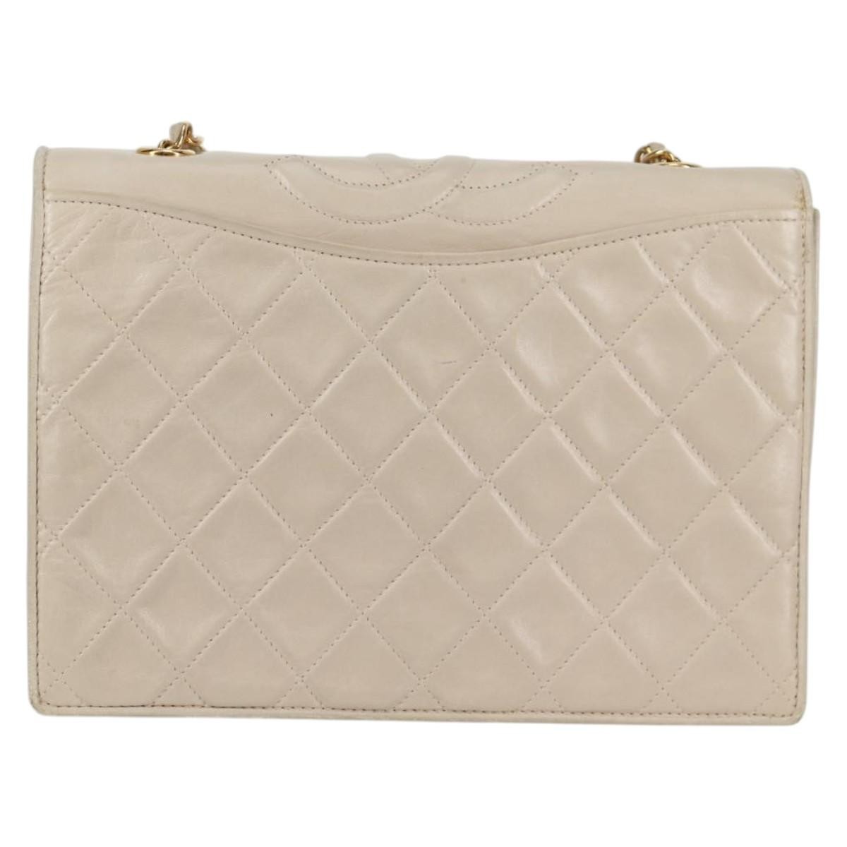 Chanel Chanel Vintage Tassel Flap Bag Quilted Lambskin Mini Goud