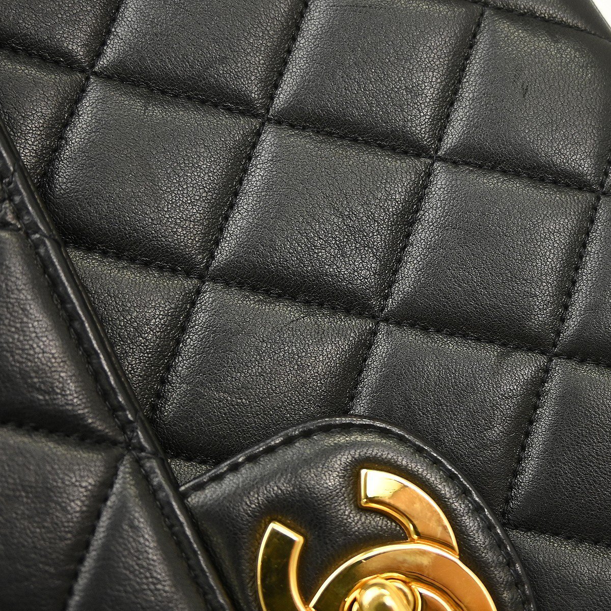 Chanel classic flap lambskin Jumbo Zwart