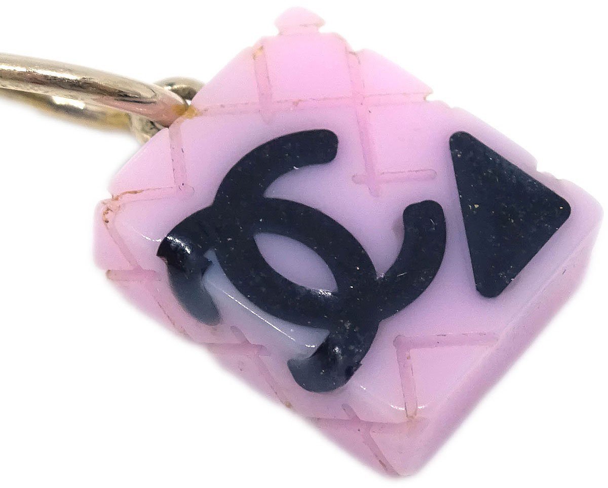 Chanel Chanel Cambon Dangle Earrings Metal and Resin Goud