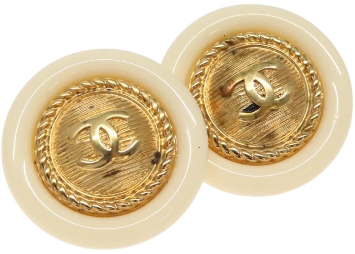 Chanel Chanel Vintage CC plastic Earrings Metal and plastic Goud
