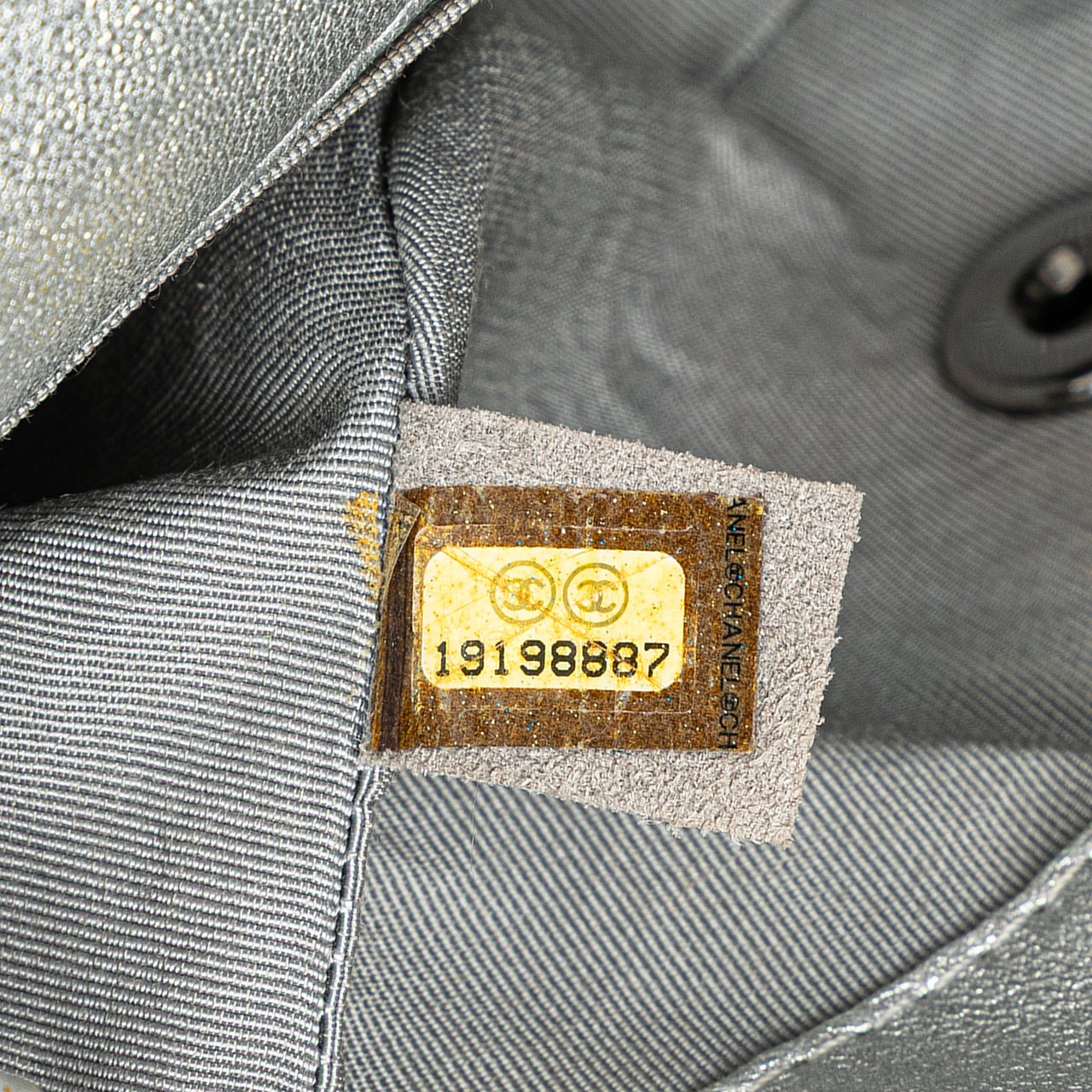 Chanel Mini Perforated Lambskin Punch Flap Zilver