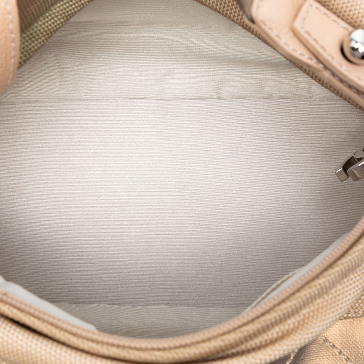 Chanel Paris Biarritz Quilted Coated Canvas Handbag Goud