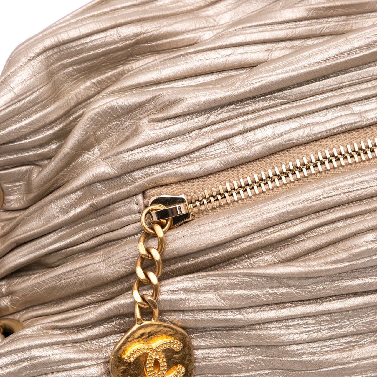 Chanel Medium Metallic Calfskin Coco Pleats Drawstring Backpack Goud