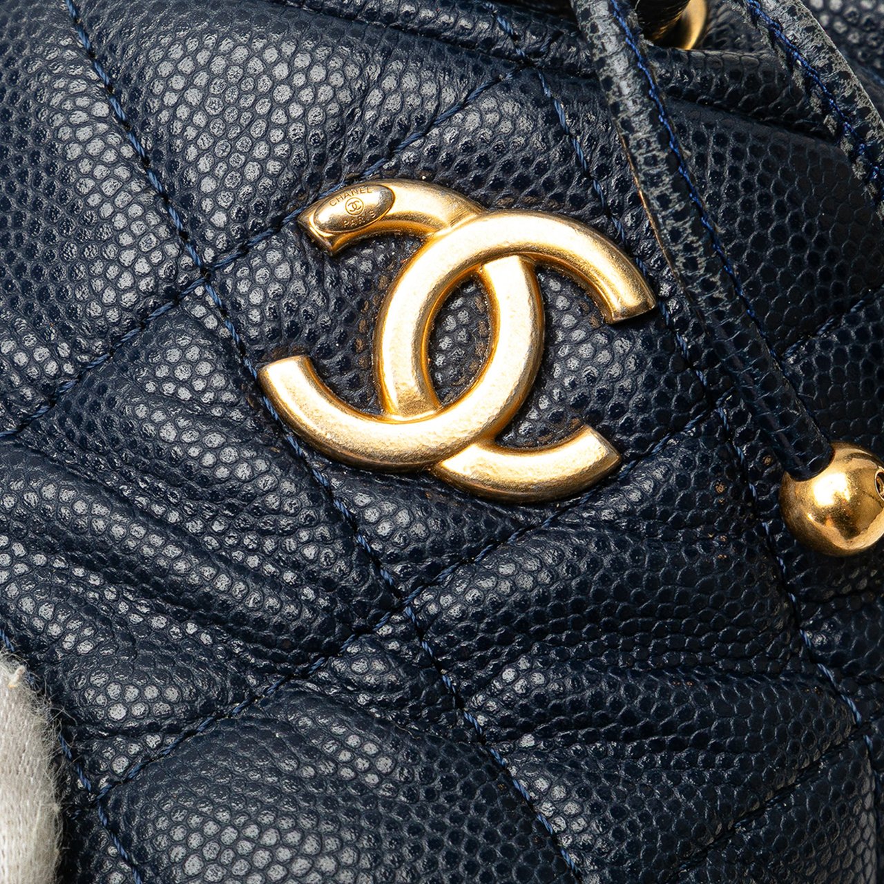 Chanel Mini Quilted Caviar Medallion Charms Drawstring Bucket Bag Blauw