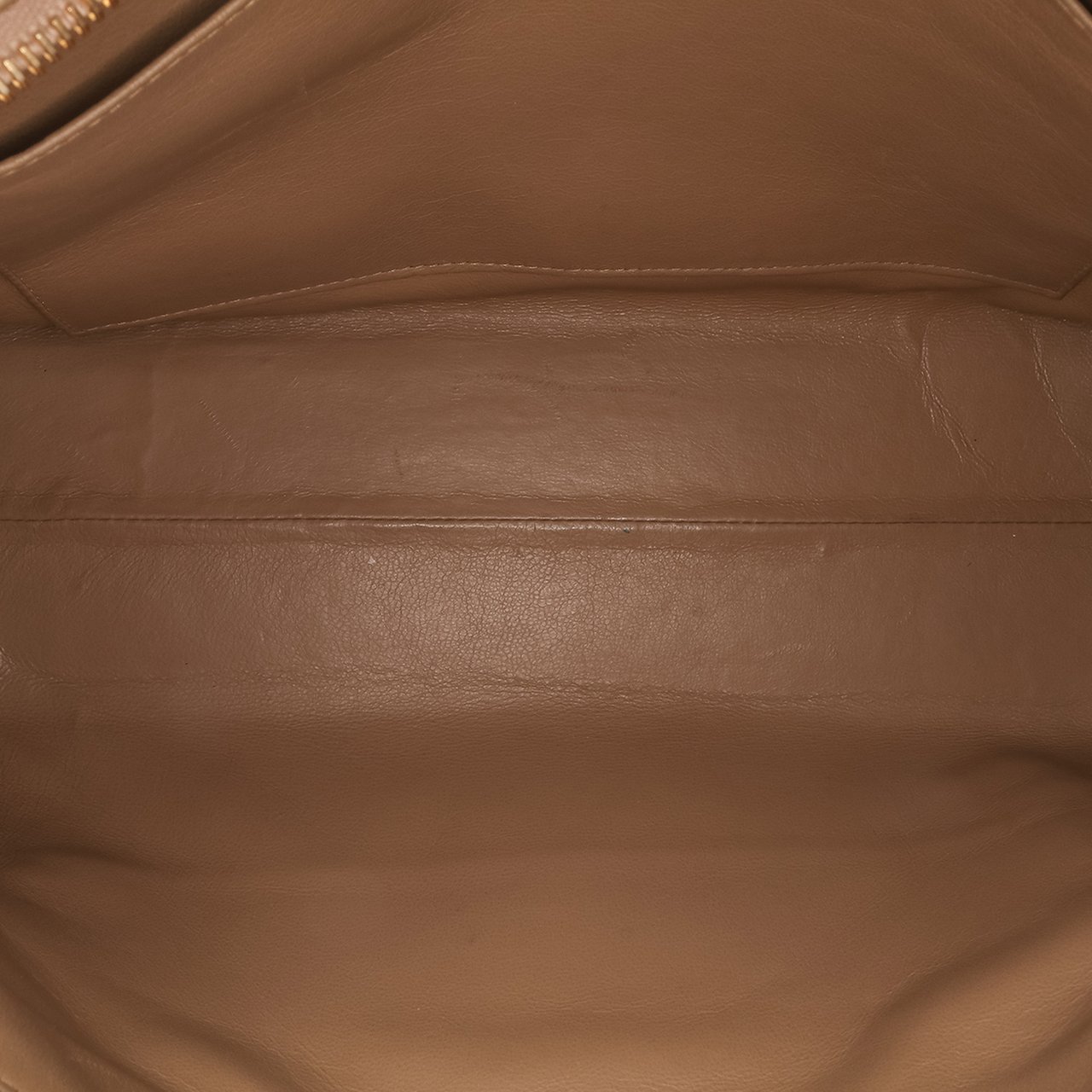 Chanel Quilted Lambskin Sun Charm Chain Crossbody Bruin