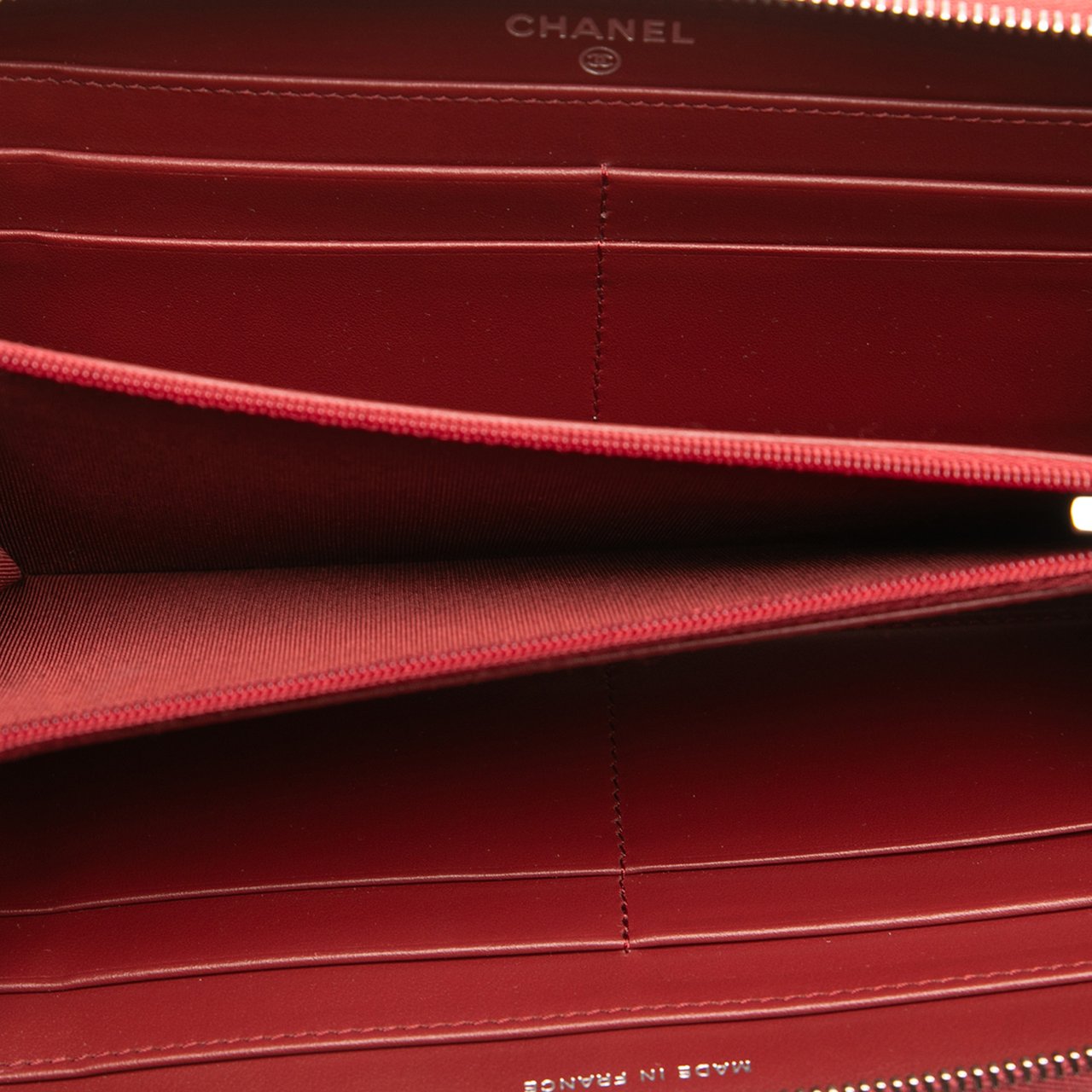 Chanel CC Quilted Caviar Zip Around Long Wallet Rood