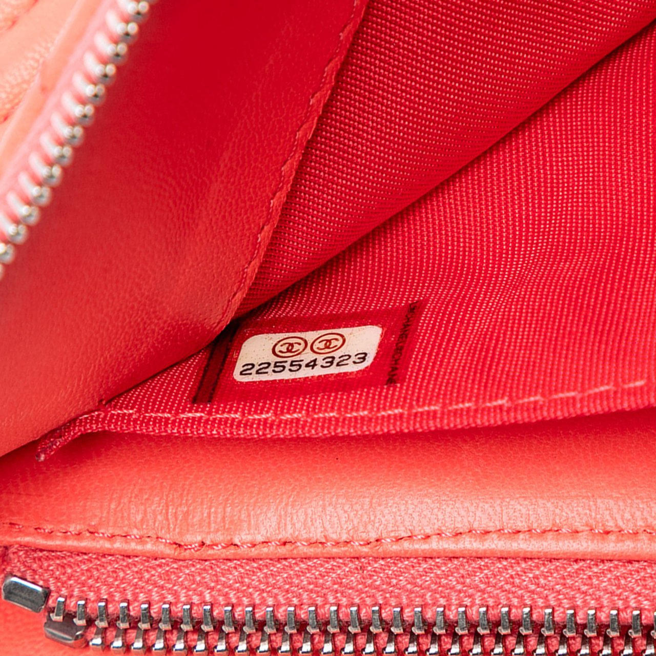 Chanel CC Chevron Calfskin Zip Clutch Oranje