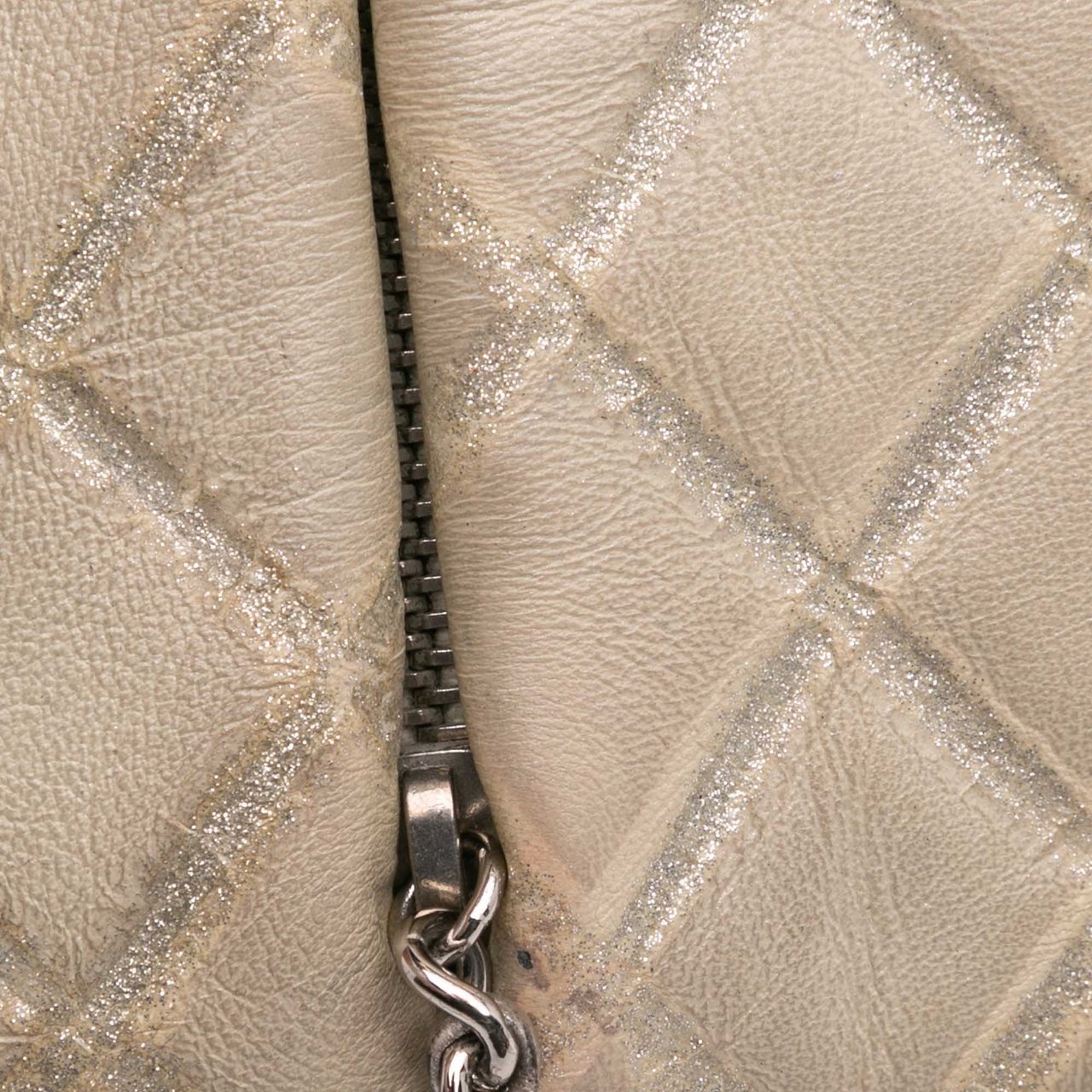 Chanel Quilted Metallic Distressed Lambskin CC Crystal Flap Bruin