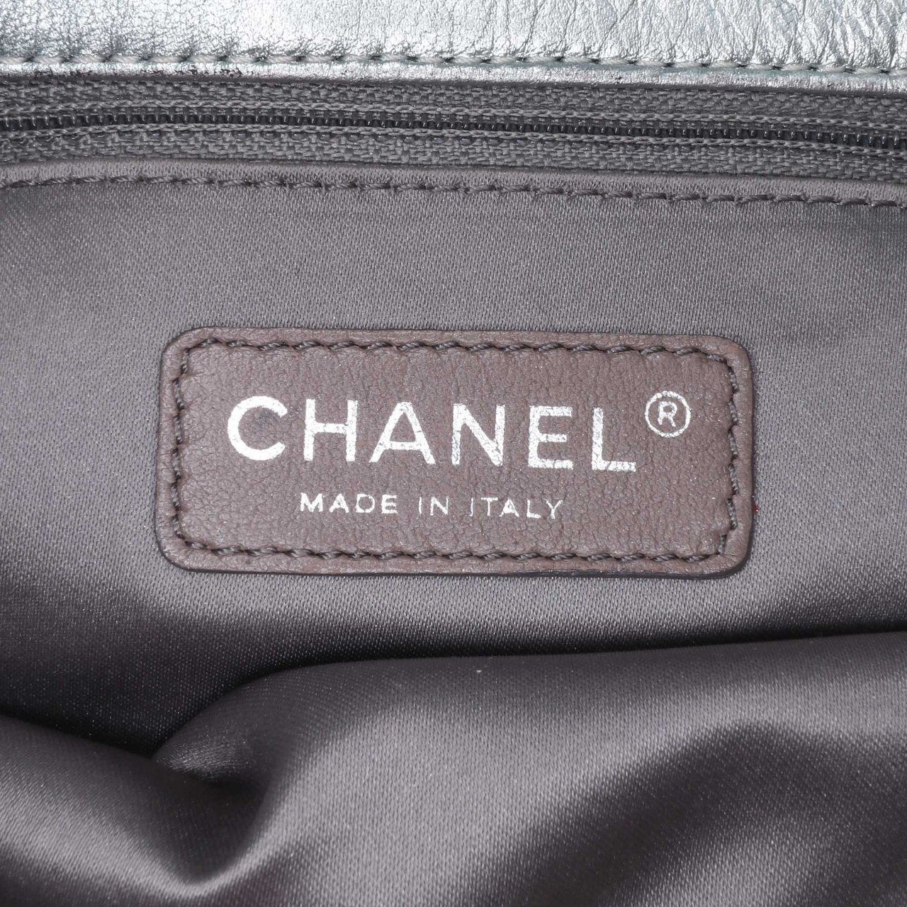 Chanel Quilted Metallic Distressed Lambskin CC Crystal Flap Bruin