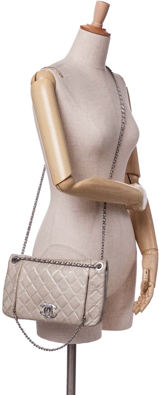 Chanel Quilted Metallic Distressed Lambskin CC Crystal Flap Bruin