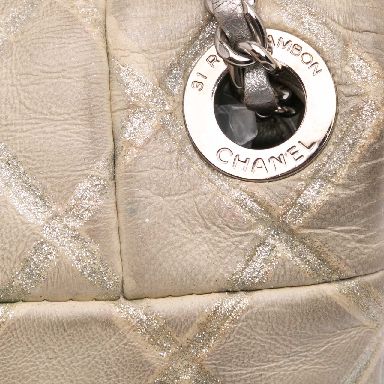 Chanel Quilted Metallic Distressed Lambskin CC Crystal Flap Bruin