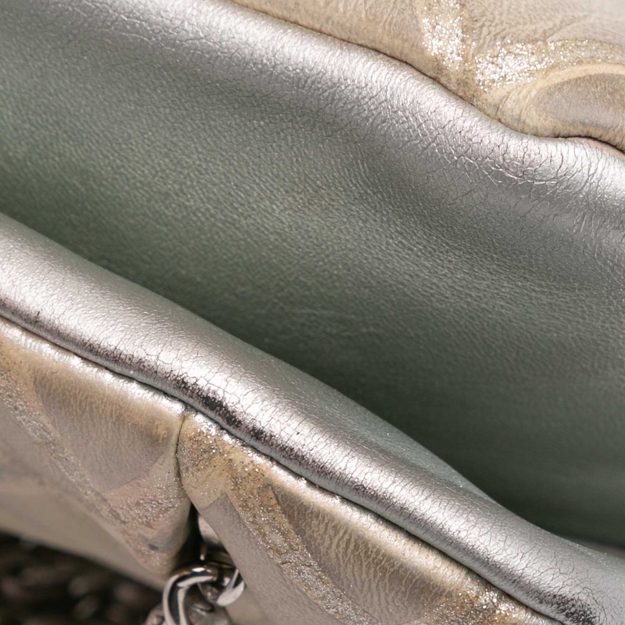 Chanel Quilted Metallic Distressed Lambskin CC Crystal Flap Bruin