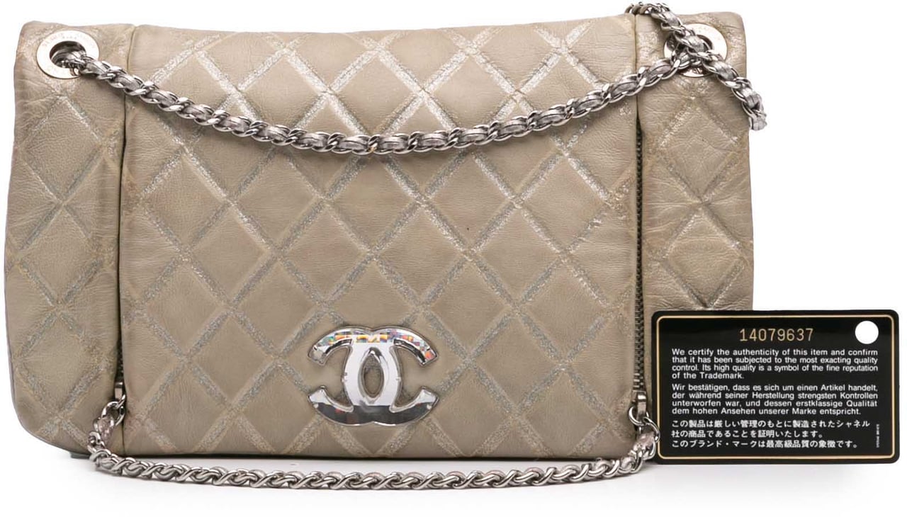 Chanel Quilted Metallic Distressed Lambskin CC Crystal Flap Bruin
