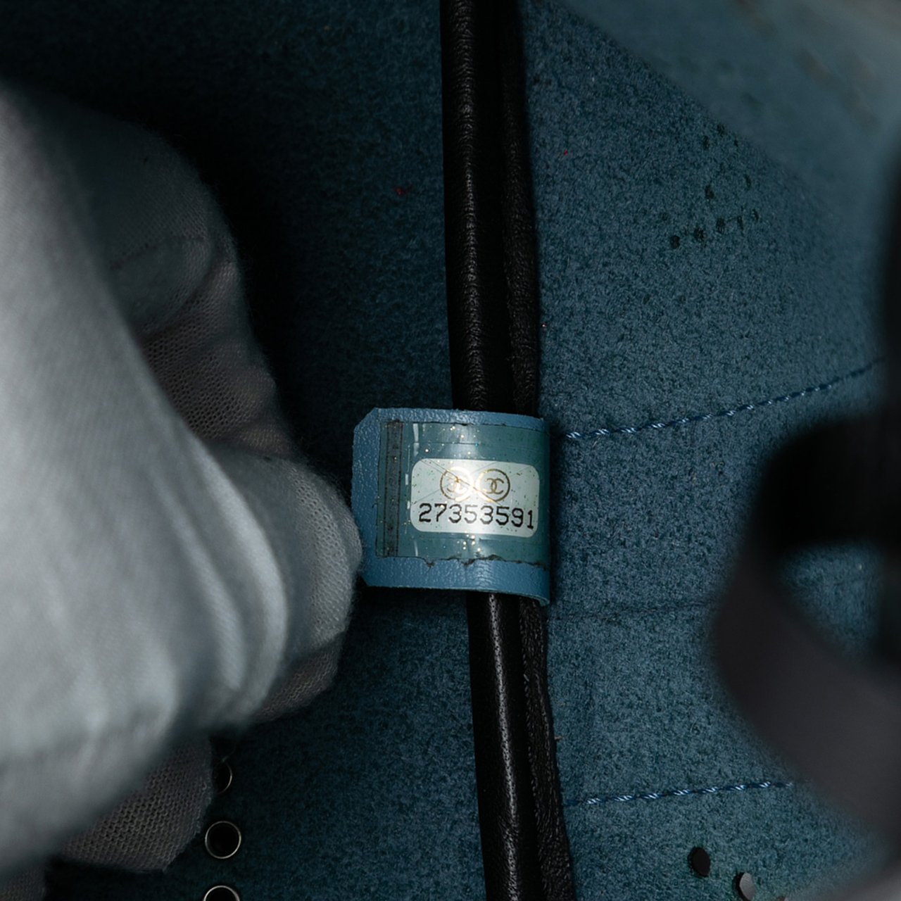 Chanel Small Perforated Calfskin Logo Eyelet Bucket Bag Zwart