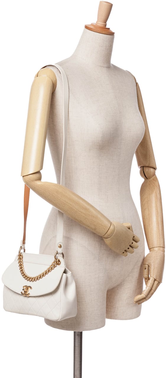 Chanel Quilted Lambskin Curved Flap Wit