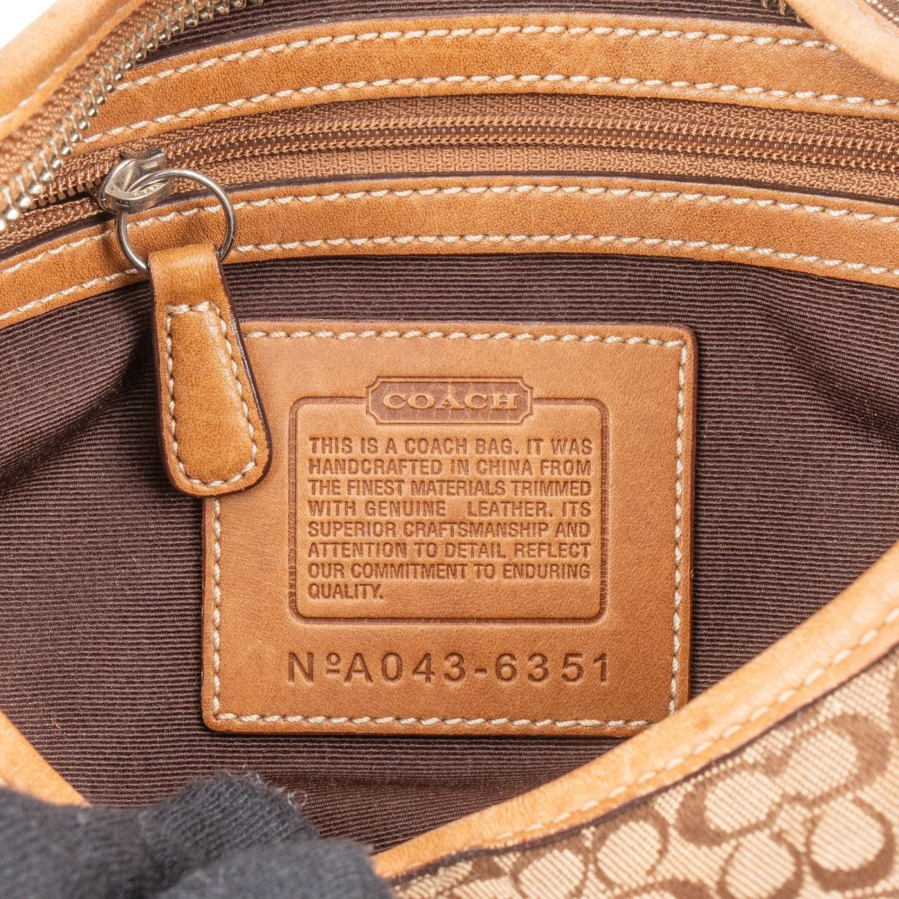 Coach Coach Monogram Signature Small Hobo Shoulder Bag Bruin