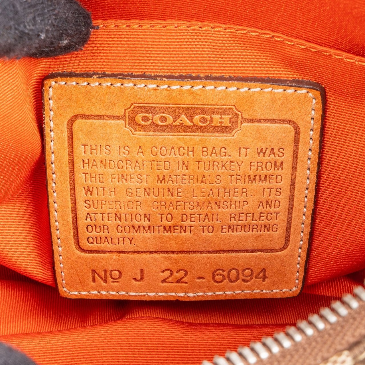 Coach Coach Signature Monogram Pochette Handbag Bruin