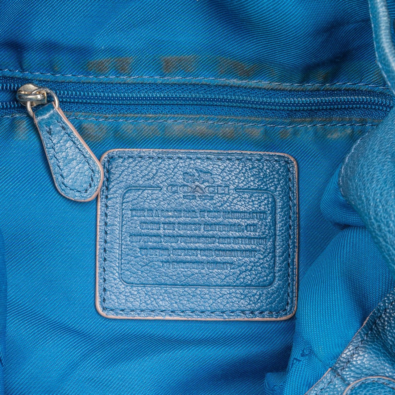 Coach Pebbled Leather Drawstring Duffle Bucket Crossbody Bag Blauw