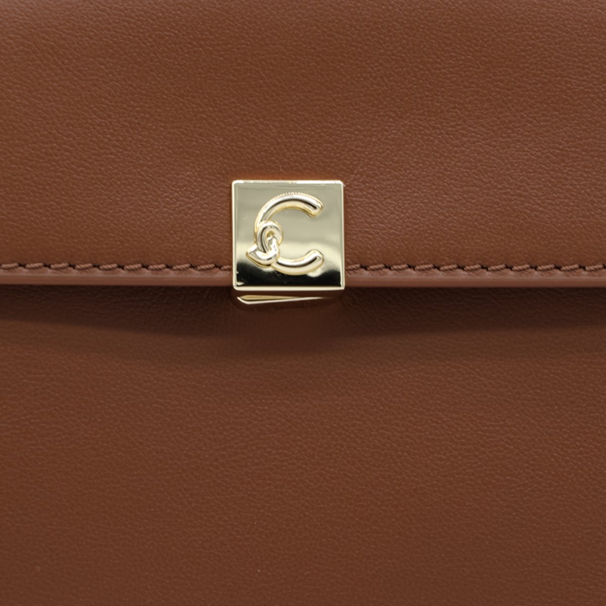 Coccinelle Structured Leather Handbag with Suede Side Panels Grijs