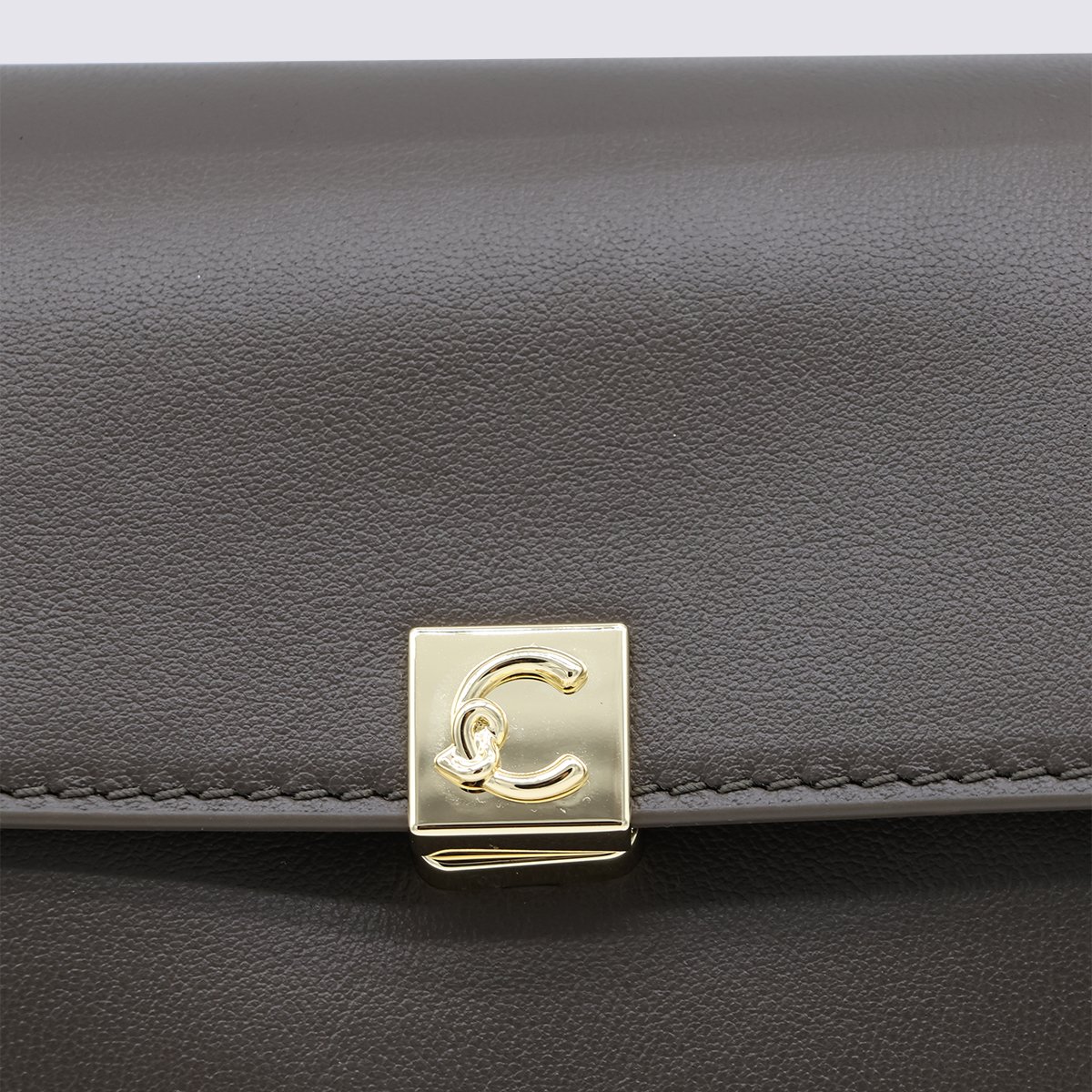 Coccinelle Structured Handbag with Suede Side Panels Grijs