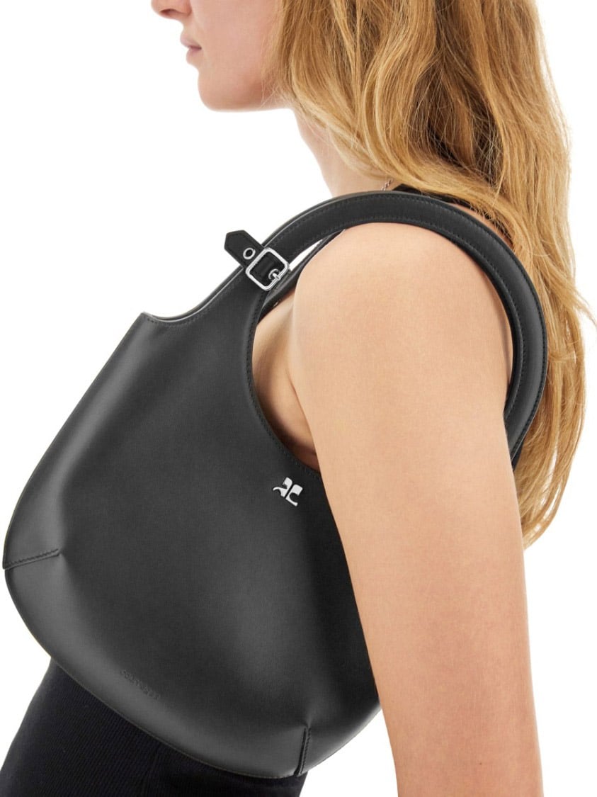 COURREGES Circular Handle Leather Bag With Adjustable Strap Zwart