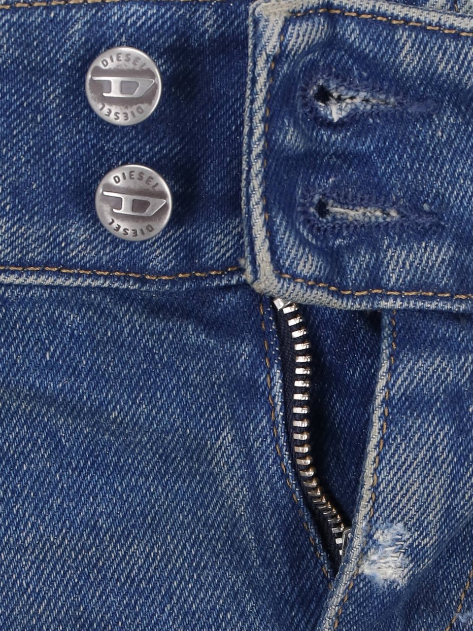 Diesel Flared Blue Wash Jeans with Vintage Distressing Blauw