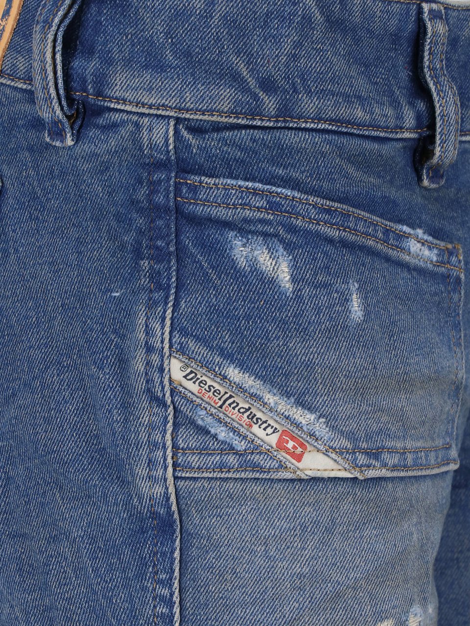 Diesel Flared Blue Wash Jeans with Vintage Distressing Blauw