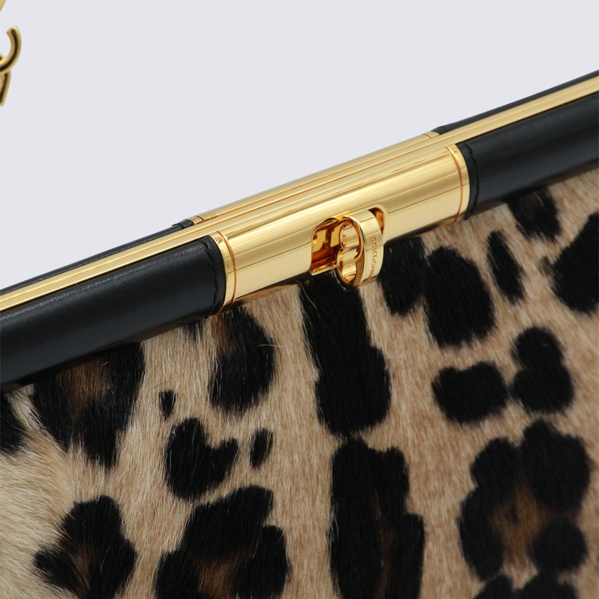 Dolce & Gabbana Plush Leopard Print Handbag With Structured Frame And Gold Accents Bruin