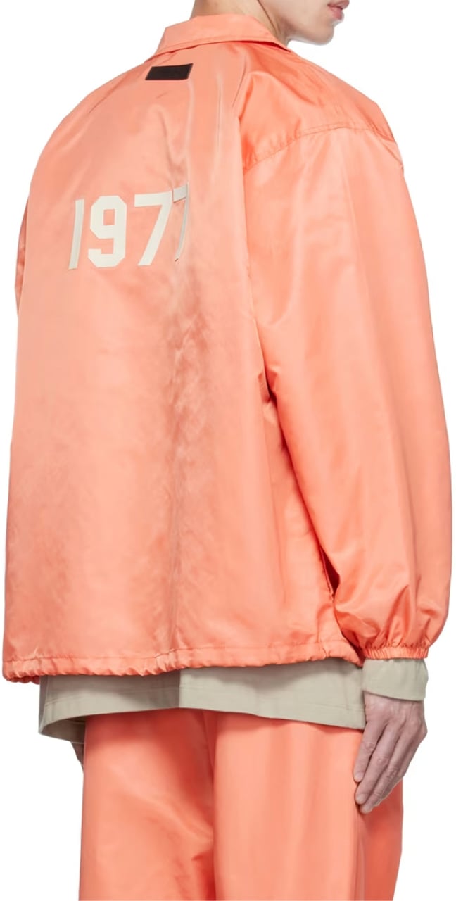 Fear of God Essentials 1977 Logo Coaches Jacket Oranje