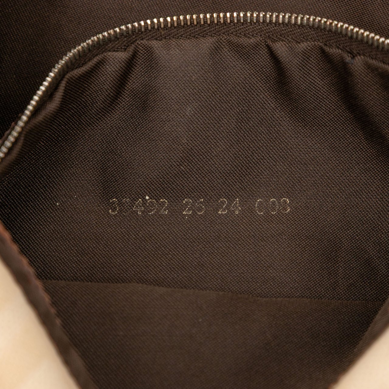 Fendi Zucca Canvas Baguette Bruin