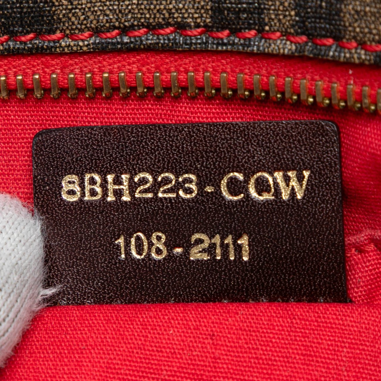 Fendi Small Perforated Zucca Spalmati Roll Tote Bruin