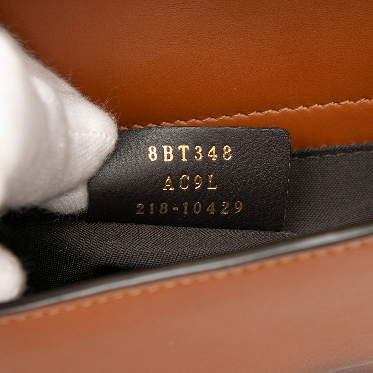 Fendi Leather Debossed Logo Bucket Bag Bruin