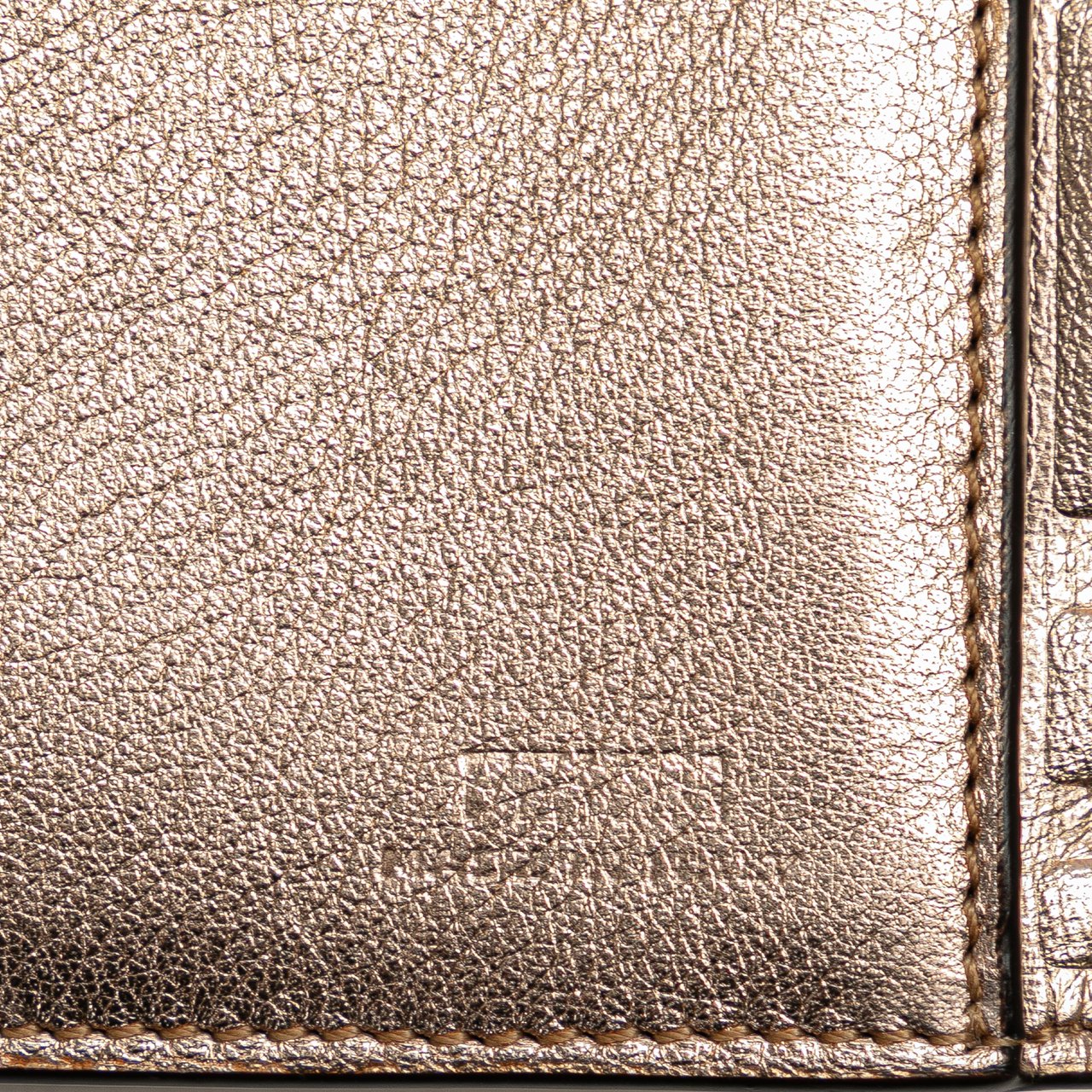Fendi Zucca Embossed Compact Wallet Goud