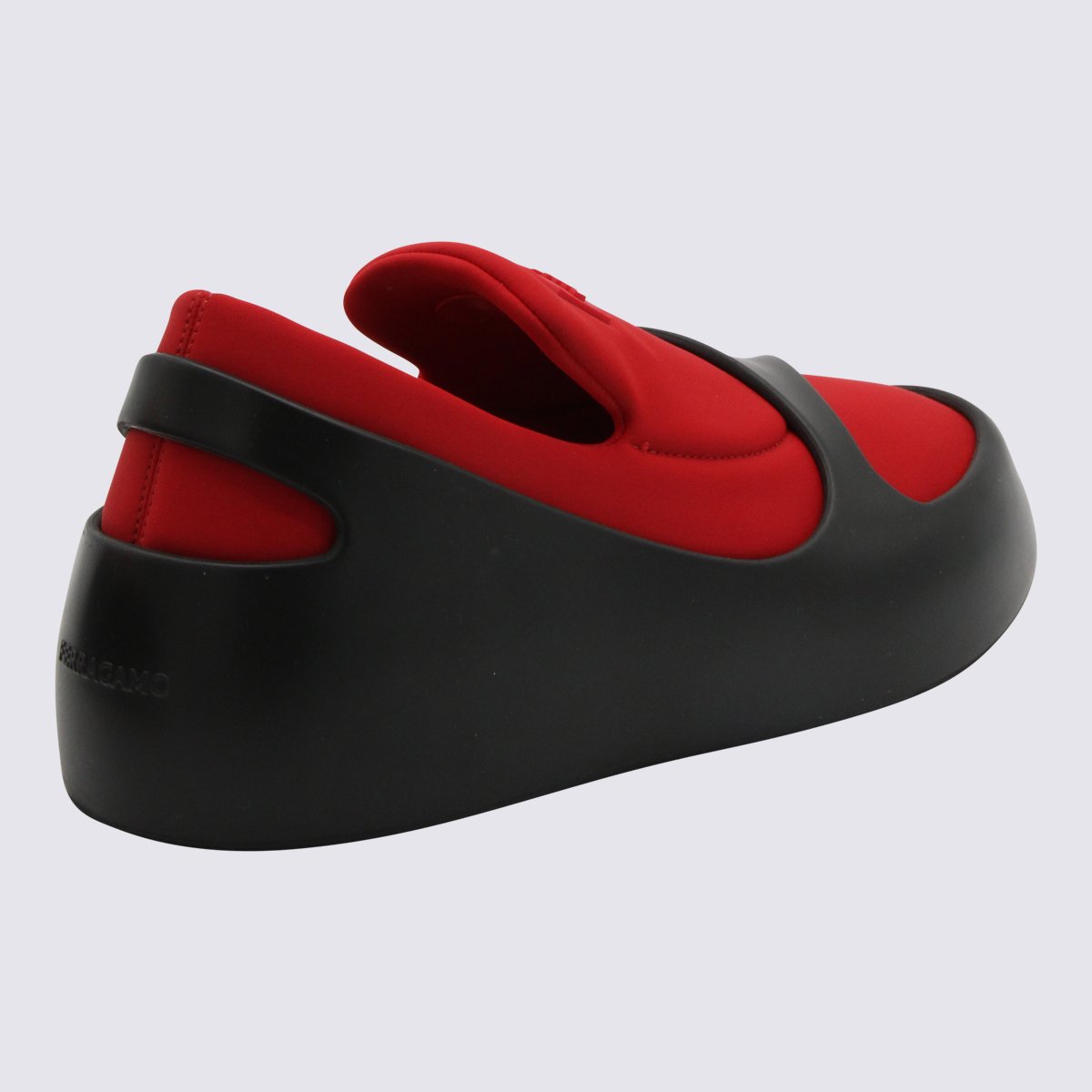 Ferragamo Matte Black Slip-On Sneakers with Vibrant Red Interior Zwart