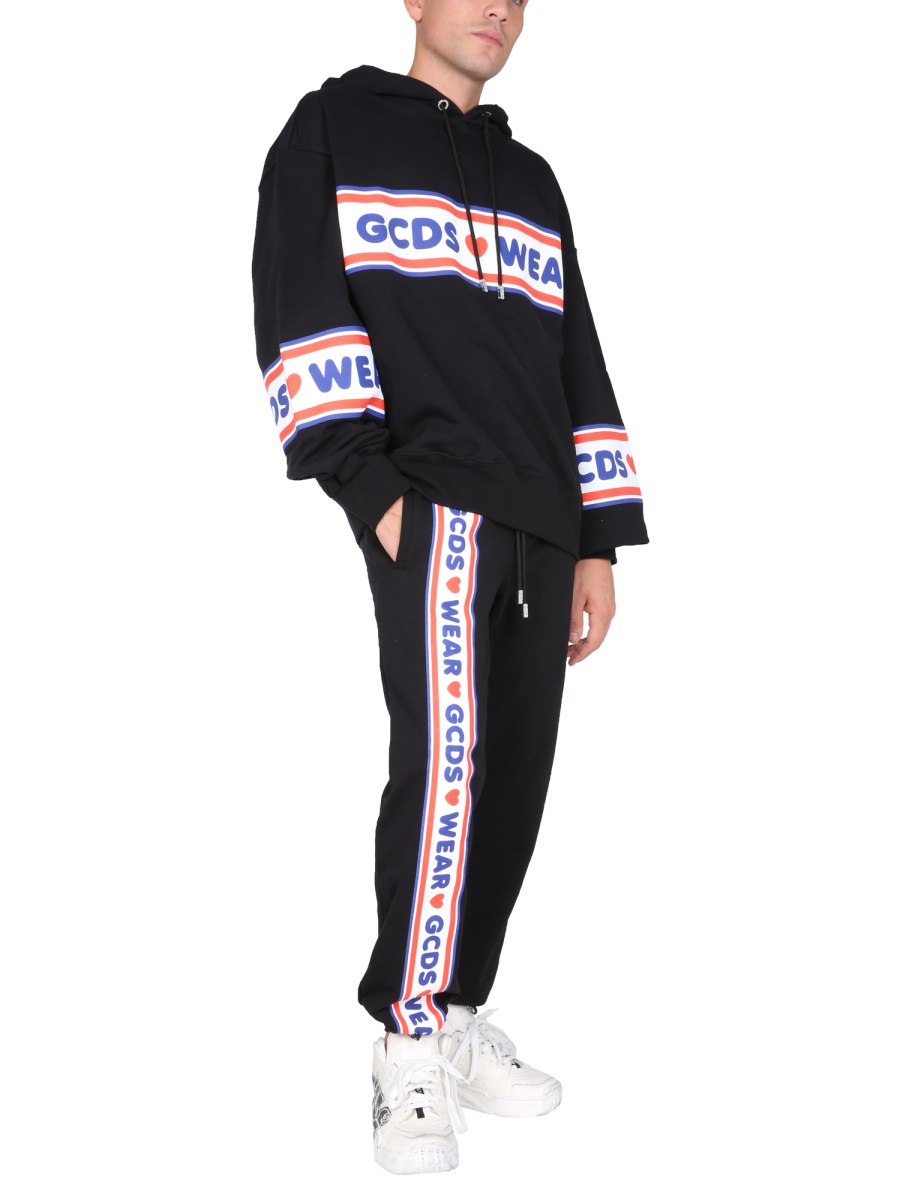 GCDS JOGGING PANTS WITH "CUTE TAPE" LOGO BAND Zwart