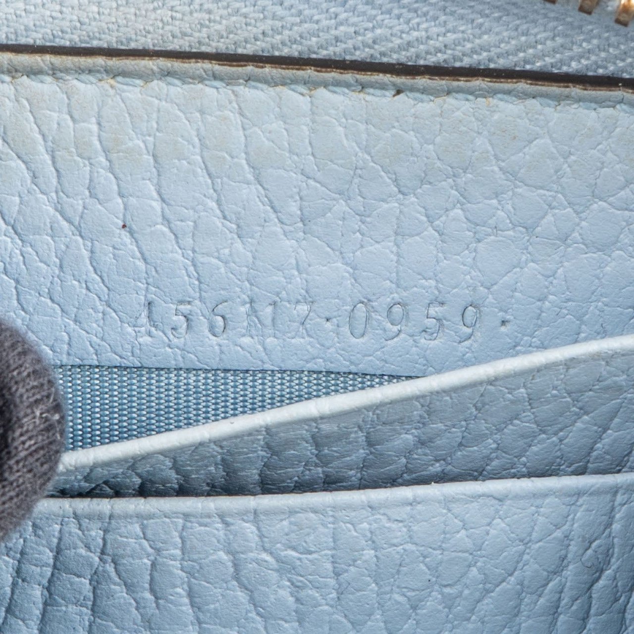 Gucci Gucci Monogram GG Supreme Marmont Zip Around Wallet Lichtblauw