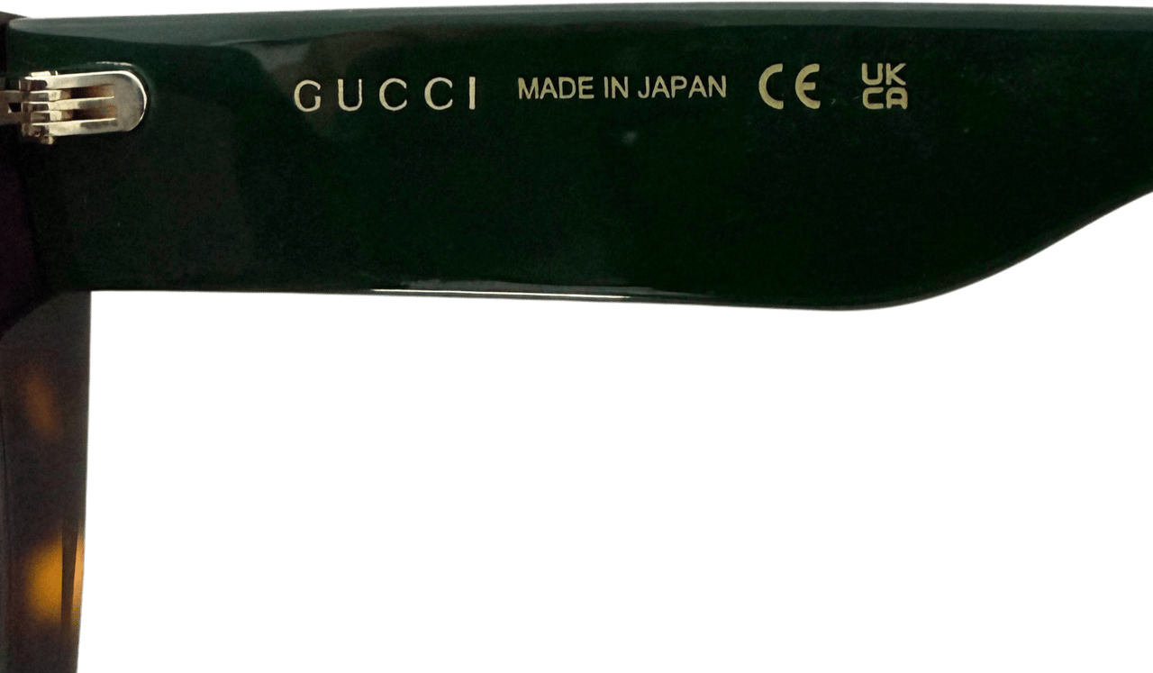 Gucci Gucci GG1300S sunglasses in Havana Dark Brown Bruin