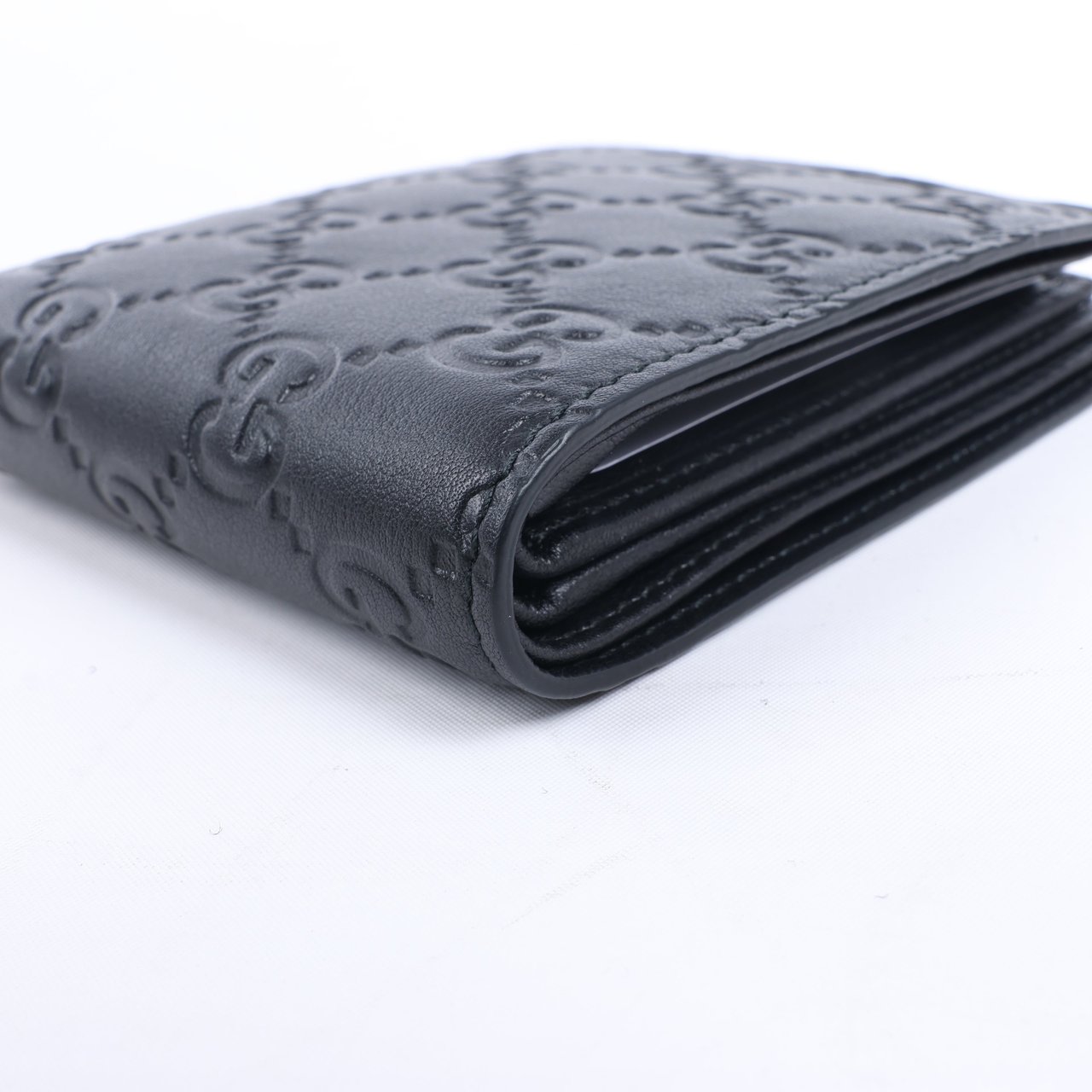 Gucci Gucci Guccissima 212185 Leather Compact Wallet in Black Zwart