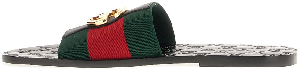 Gucci Black leather slippers Divers