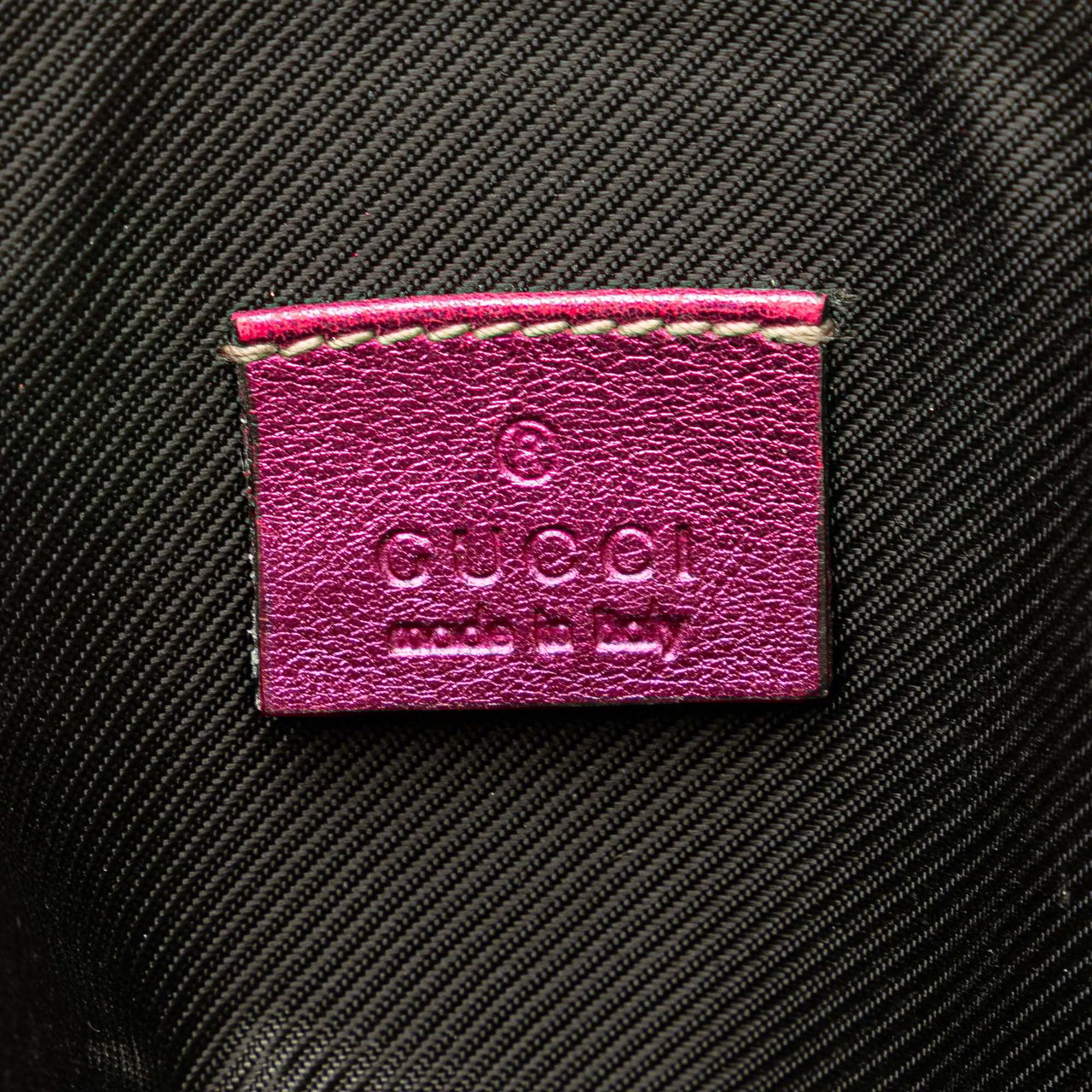 Gucci Metallic Guccissima Pouch Roze